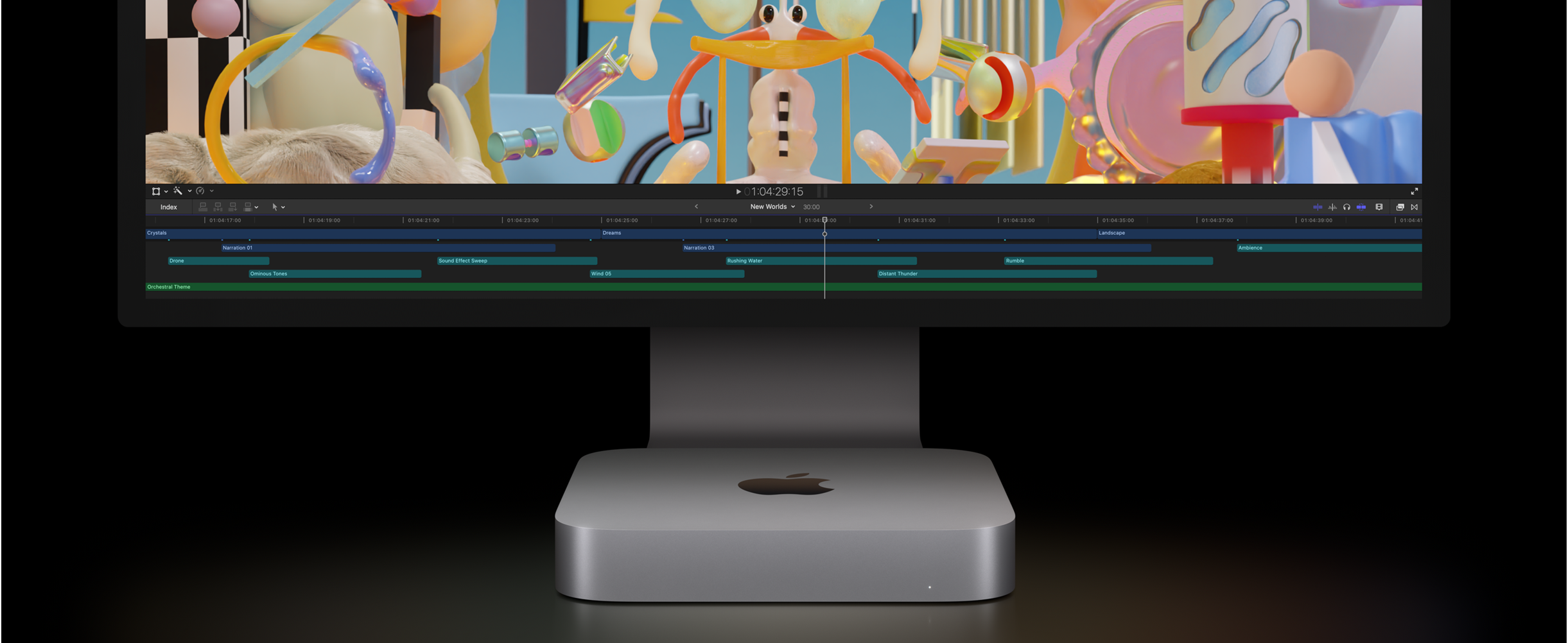 Front view of Mac mini and Studio Display showing a video editing project in Final Cut Pro.